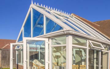 conservatory roof insulation costs Maes Glas